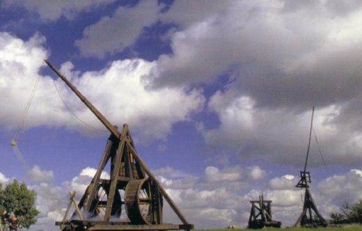 The big trebuchet in mid-launch.